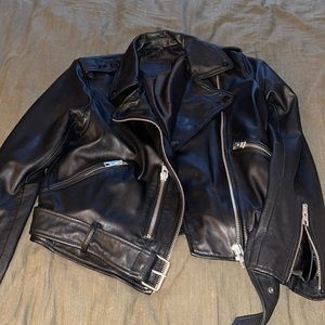 Great condition minor mark on back of the jacket. Refer to last two pictures.